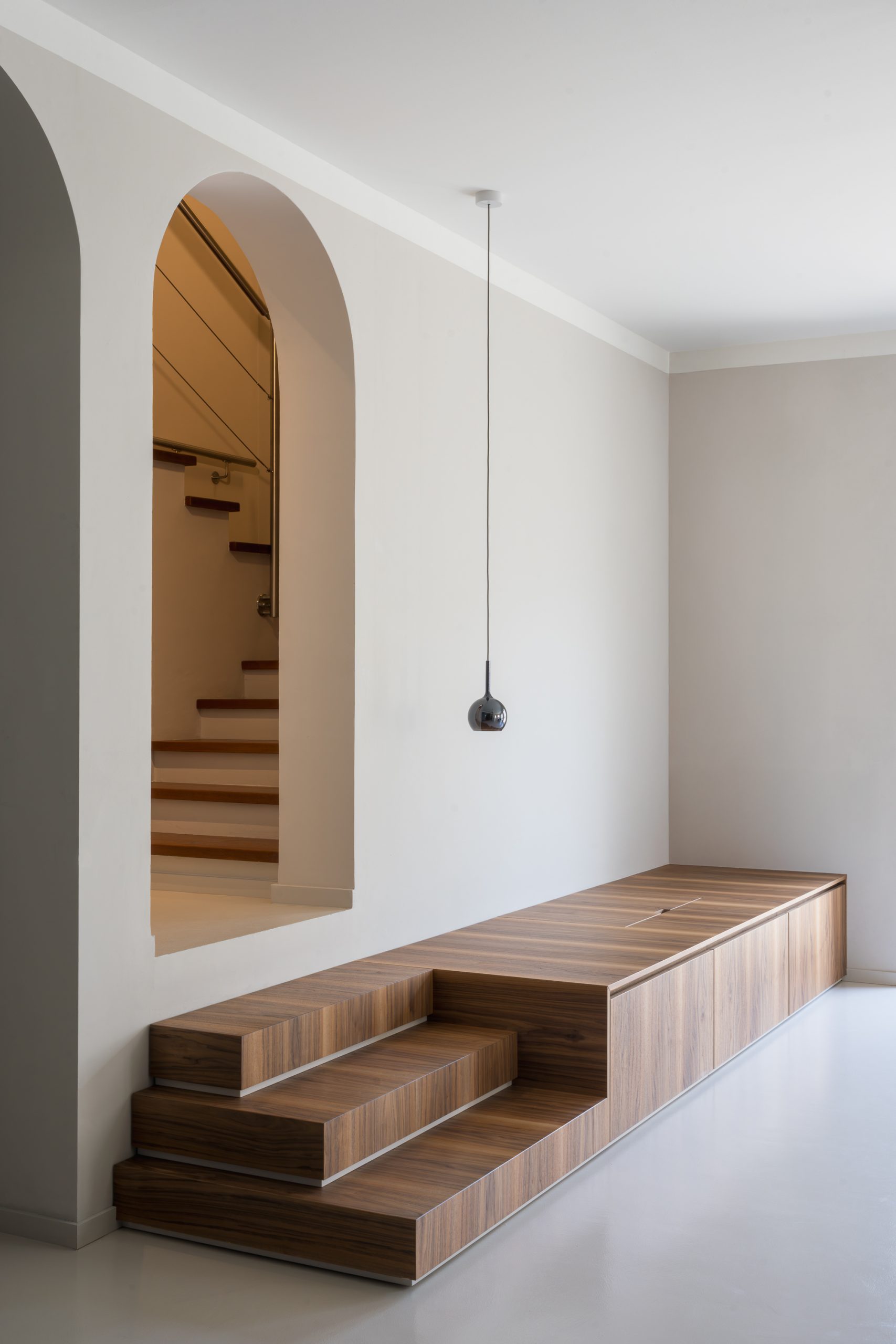Wooden staircase design by PlaC Architecture