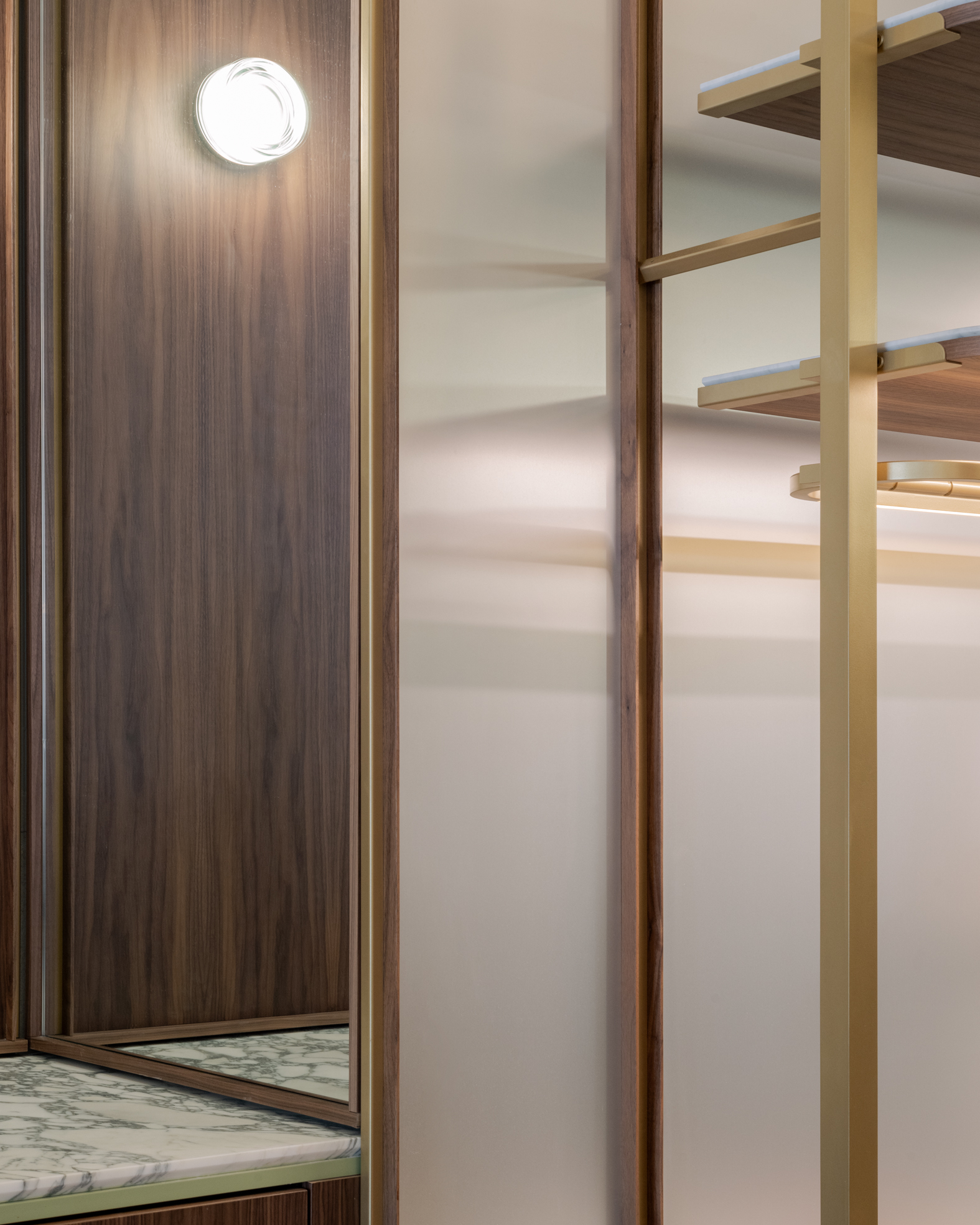 Customized furniture details designed by PlaC Architecture for a quiet luxury menswear shop