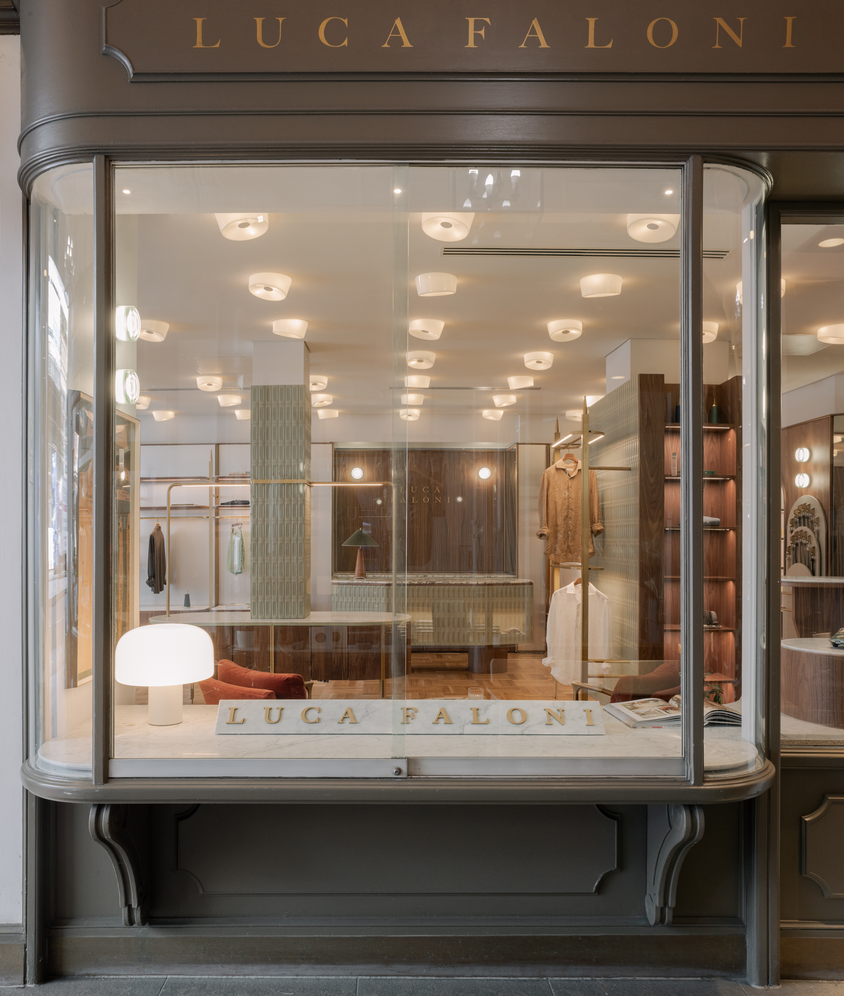 Customised display system for a clothing shop window.