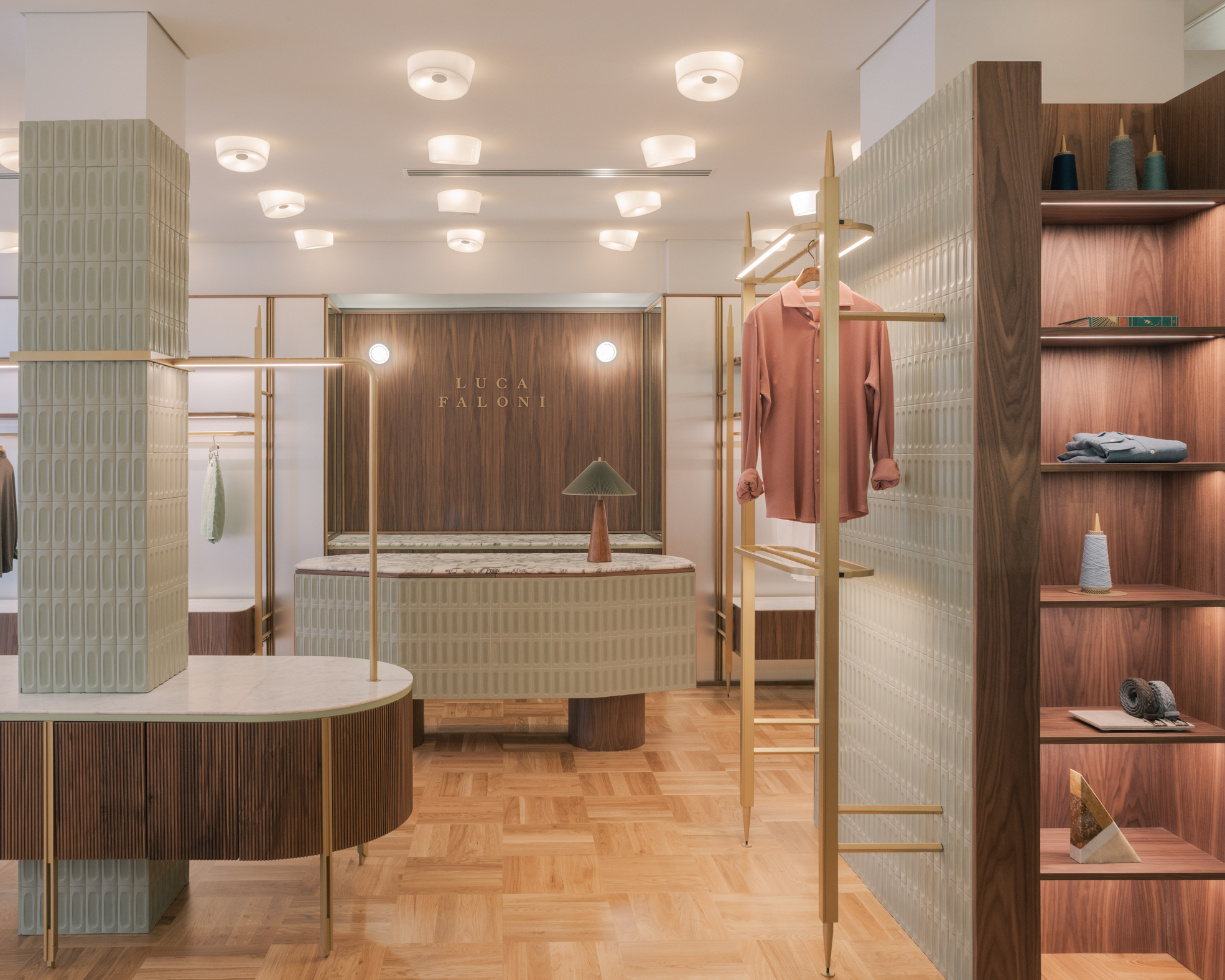 Internal area of Luca Faloni's boutique in Londn, with wooden customized furniture.