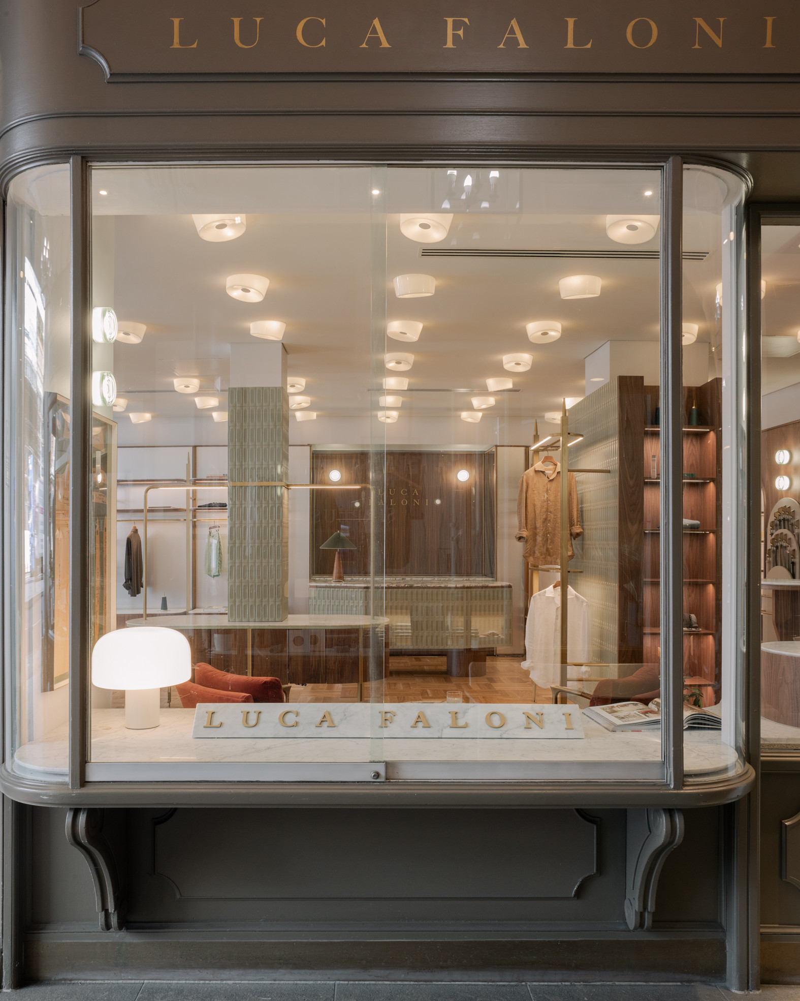 Customised display system for a clothing shop window.