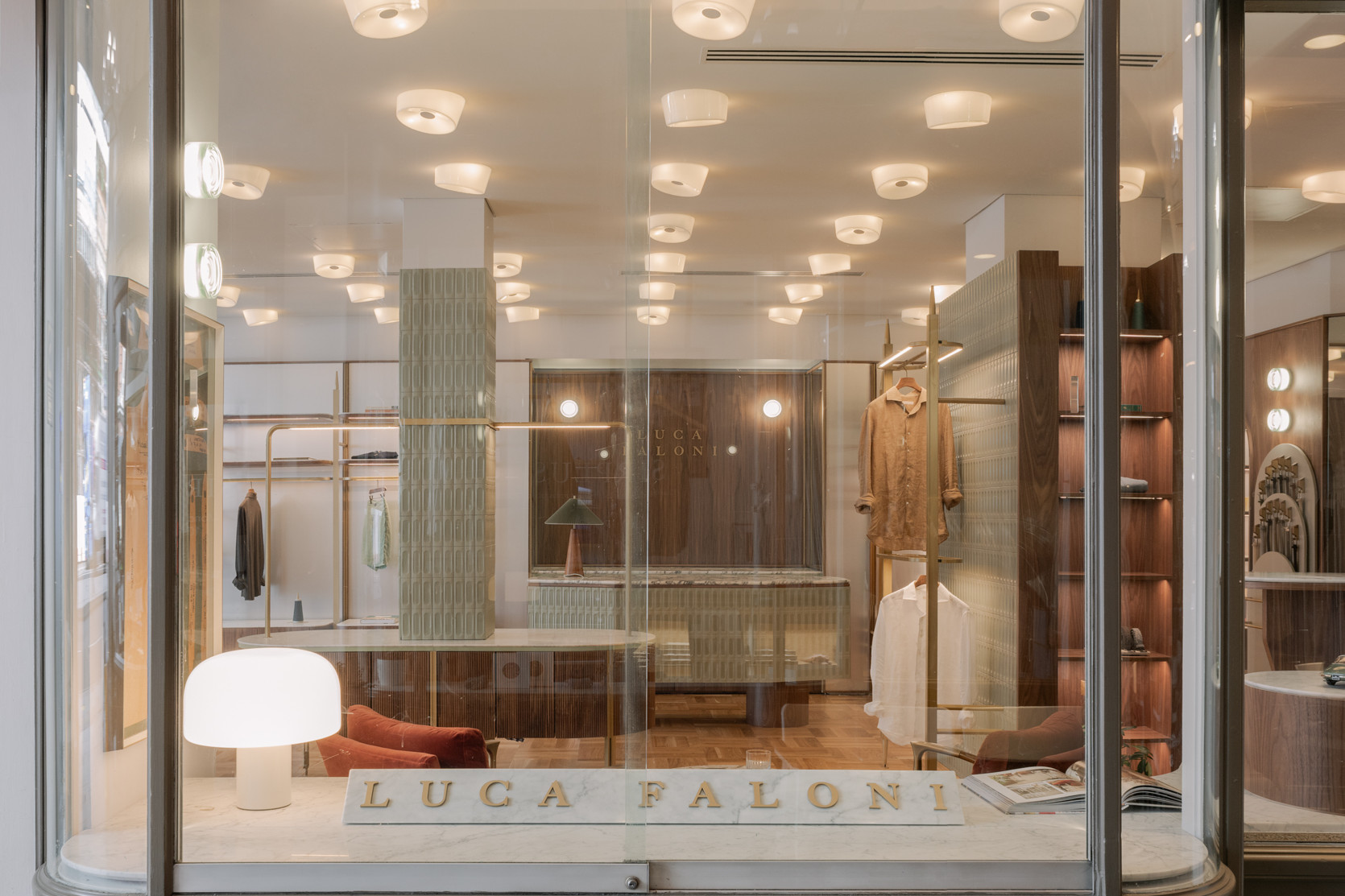 Customised display system for a clothing shop window.