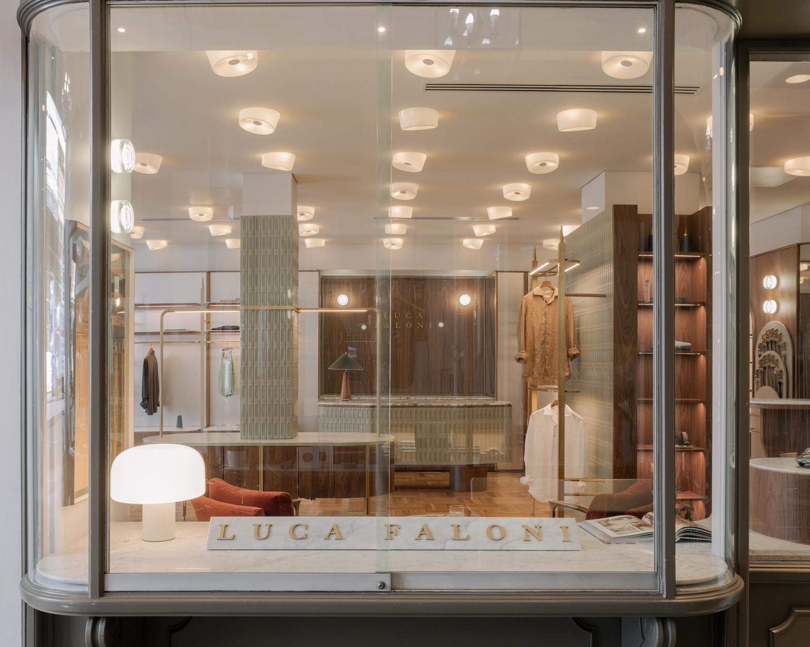 Customised display system for a clothing shop window.