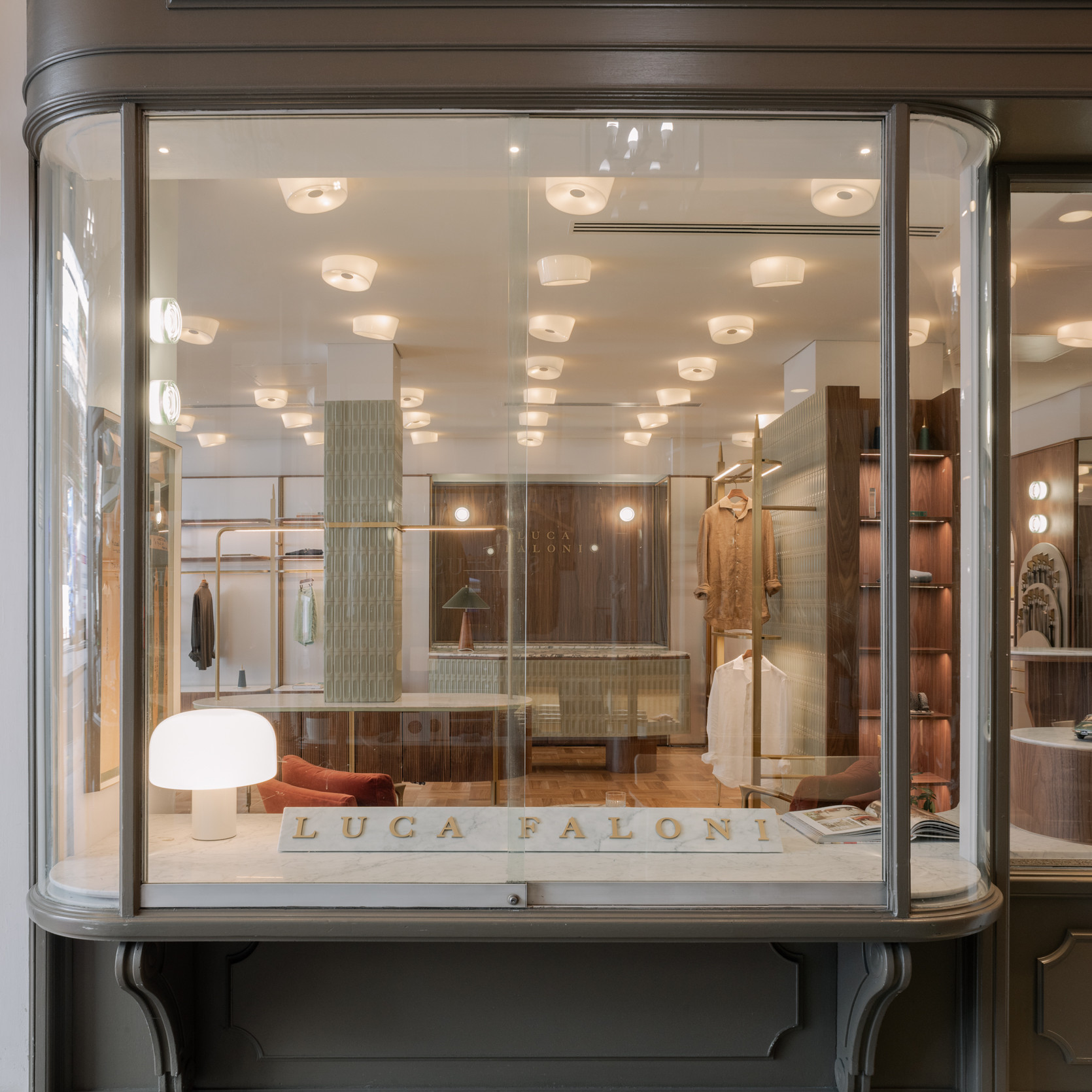 Customised display system for a clothing shop window.