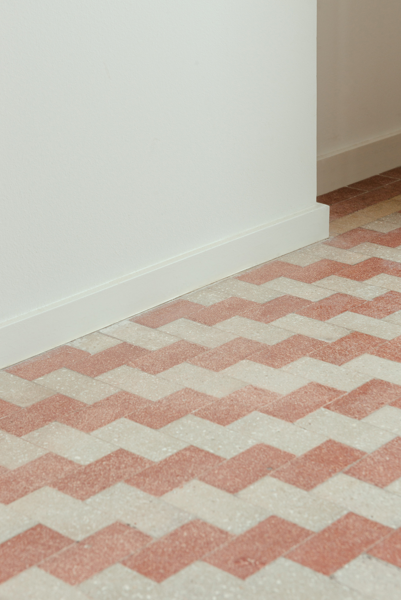 Red and white renewed floor tiles